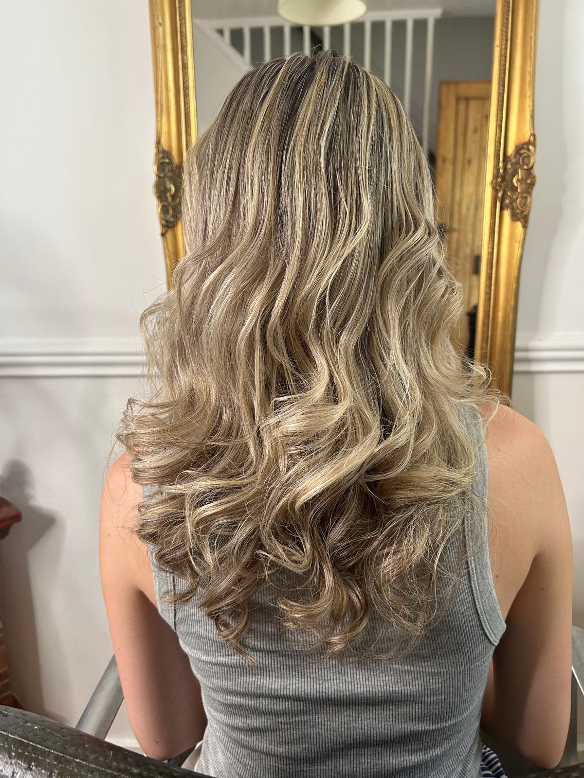 Brassy Blonde to Creamy Balayage Waves — after by Laura Astley